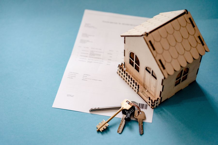 A mortgage statement beside a set of house keys